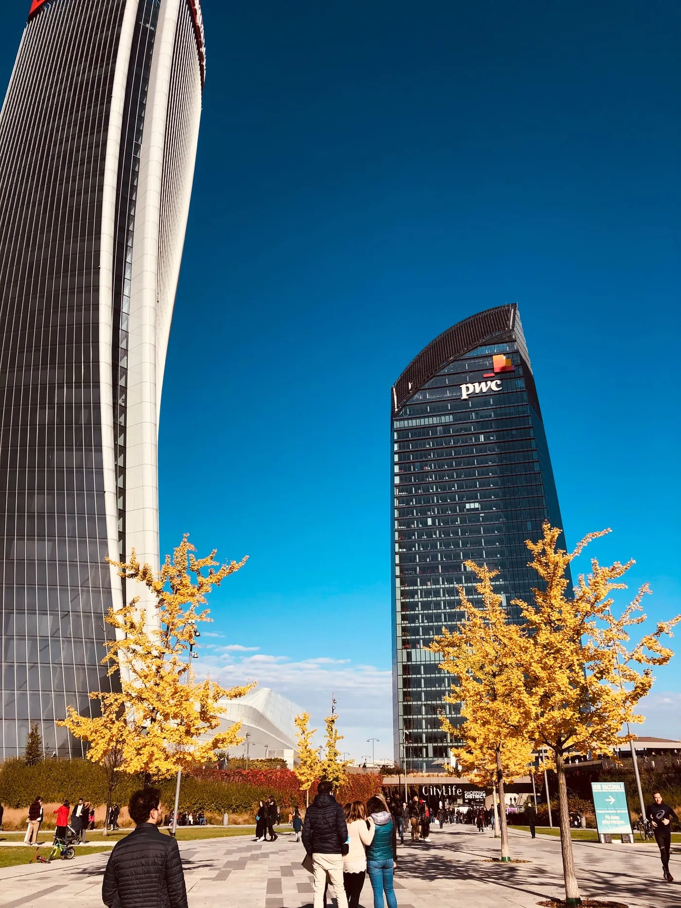 The CityLife towers seen from the park, with the yellow autumn trees
