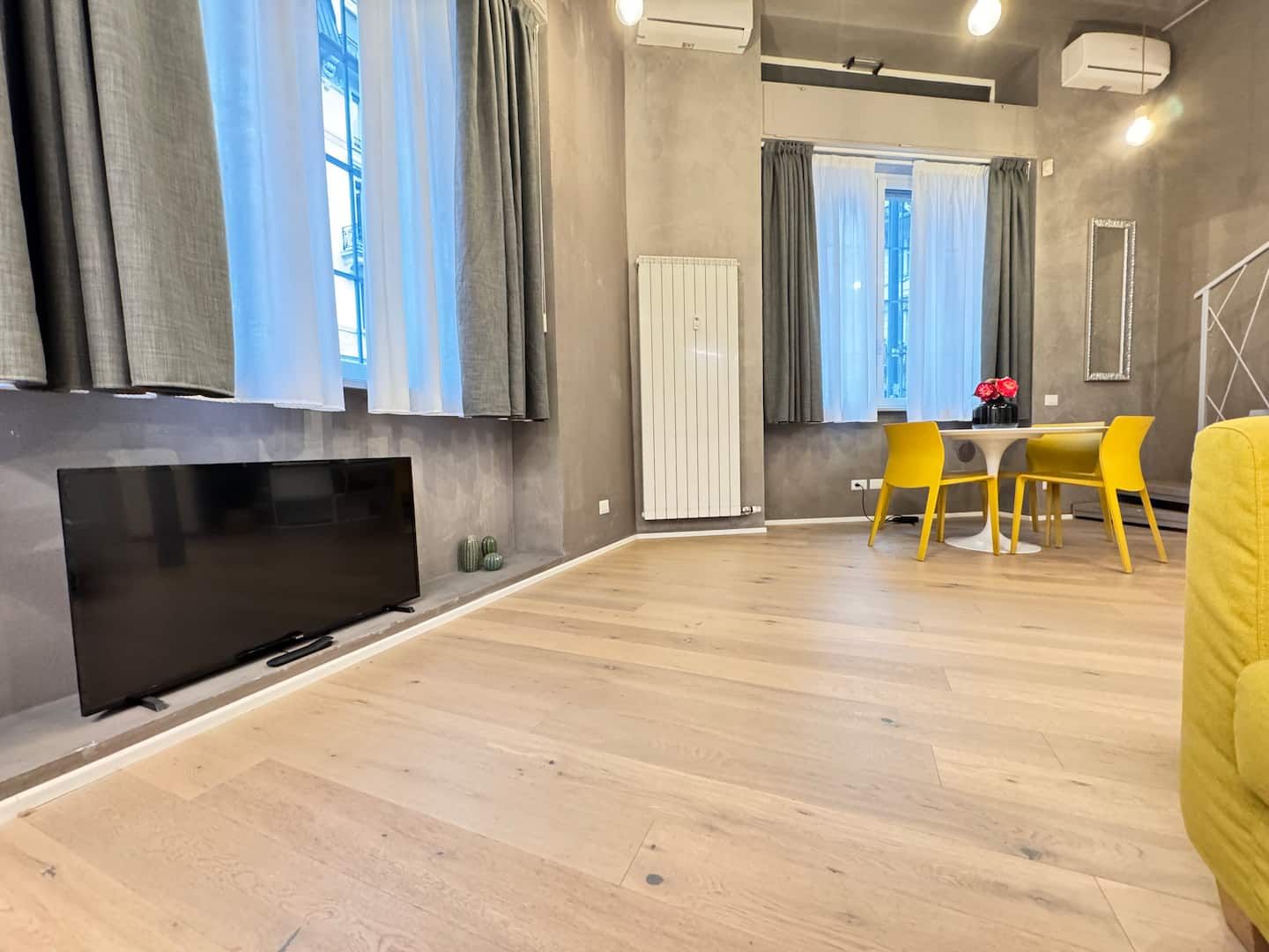 TV wall and dining corner
