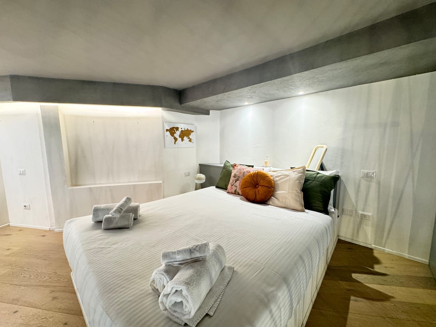 Bedroom with headboard and bedside tables