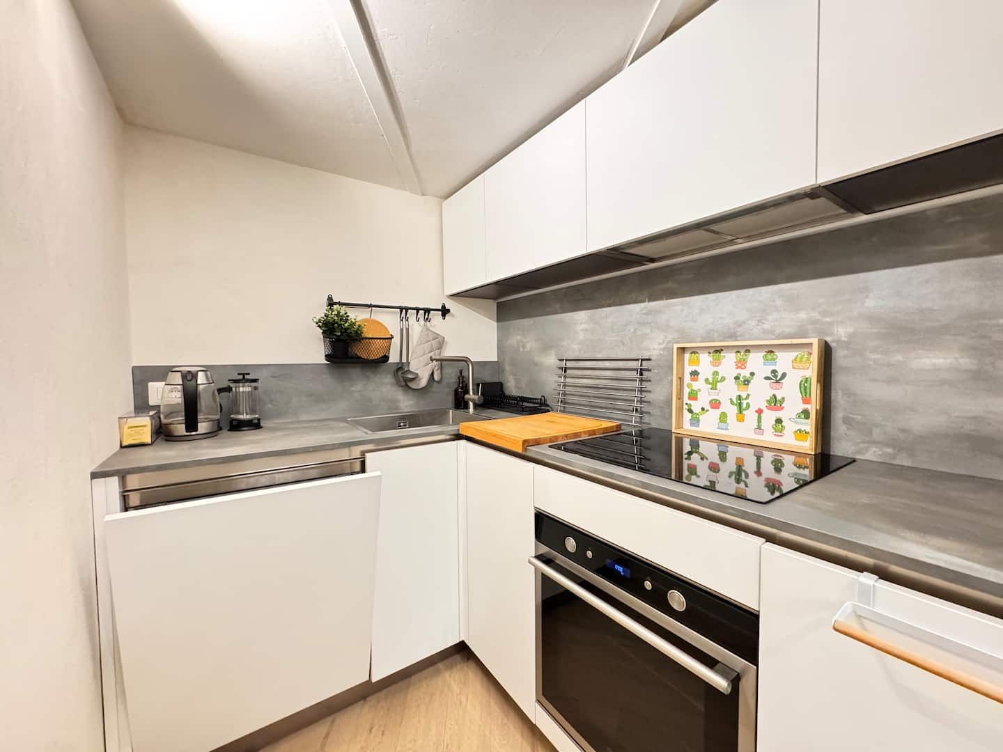 Hob, oven and coffee machine