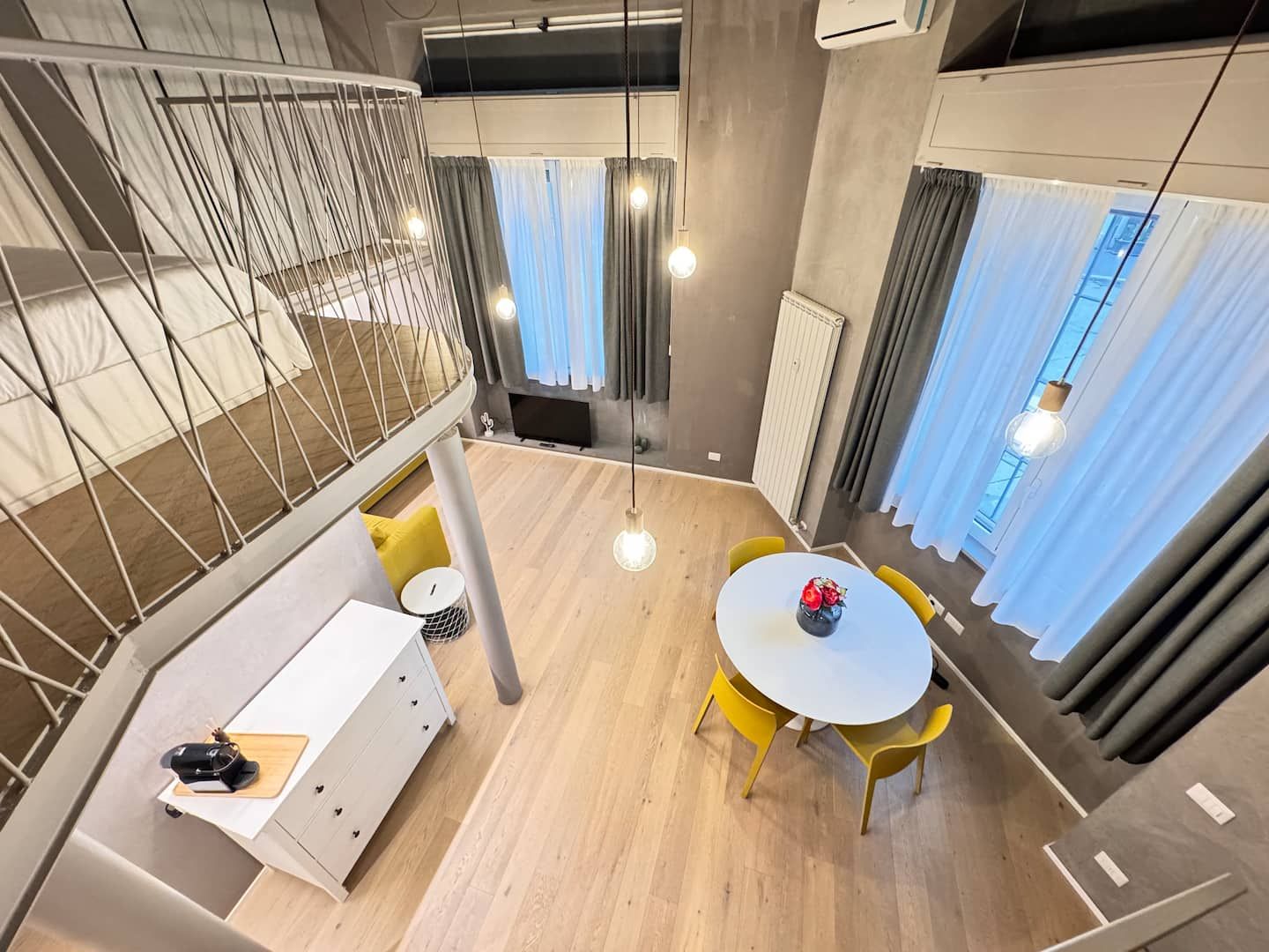 Dining table and mezzanine railing